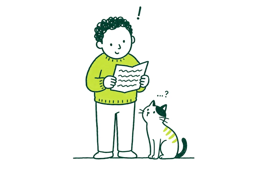 Un homme lit une lettre, surpris mais calme, son chat à côté.